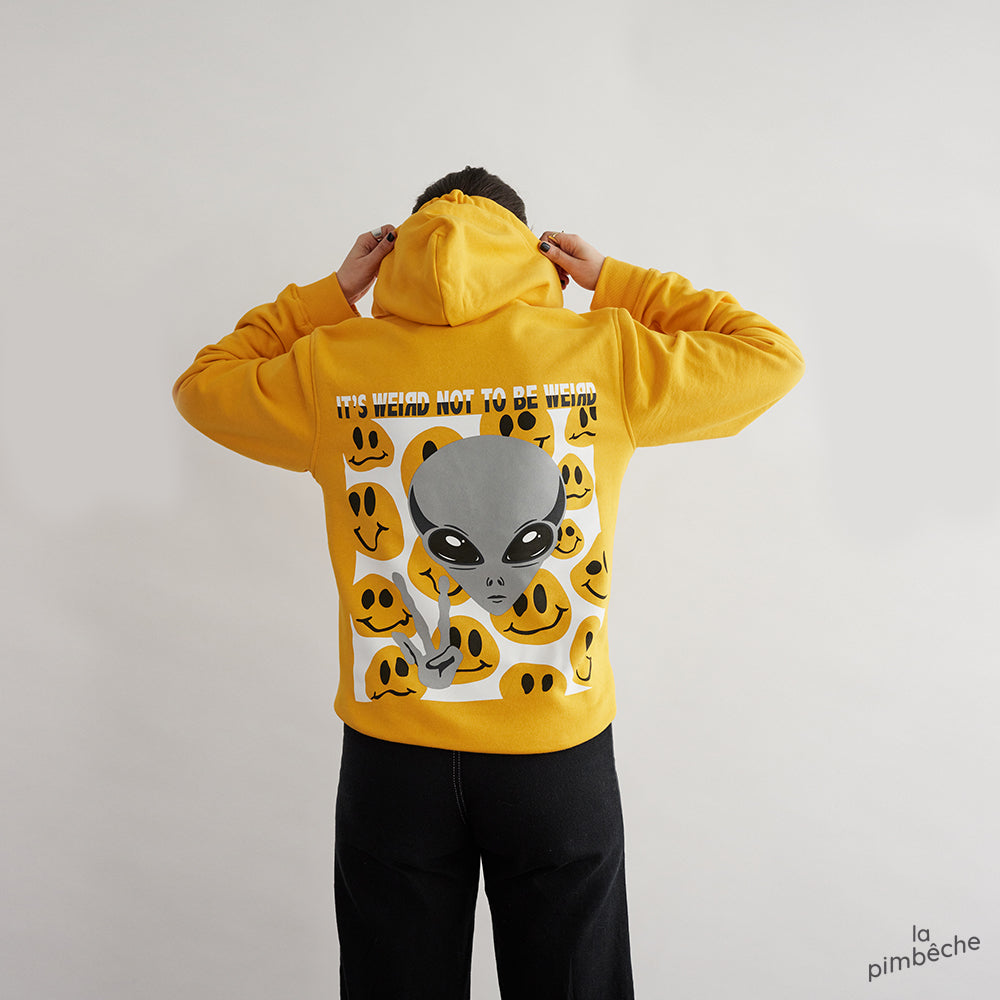 Yellow hoodie UFO happy faces It's weird not to be weird by the artist La Pimbeche from Montreal  