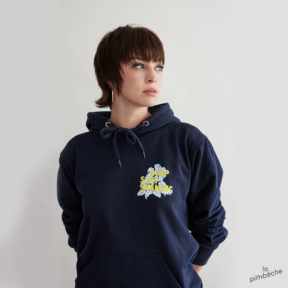 Stop Slut Shaming hoodie navy sweatshirt from artist La Pimbêche from Montreal How a woman dresses tells you nothing about how much she respects herself